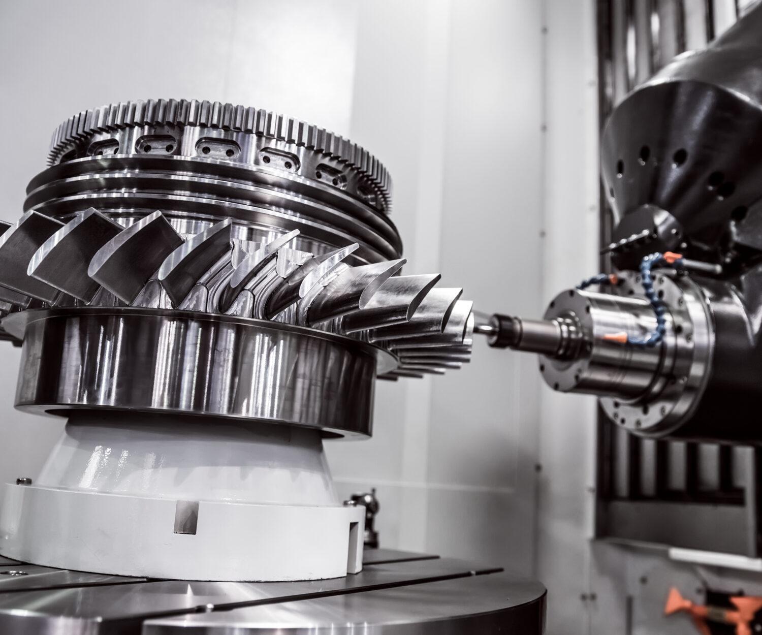 Metalworking CNC milling machine. Cutting metal modern processing technology. Small depth of field. Warning - authentic shooting in challenging conditions. A little bit grain and maybe blurred.